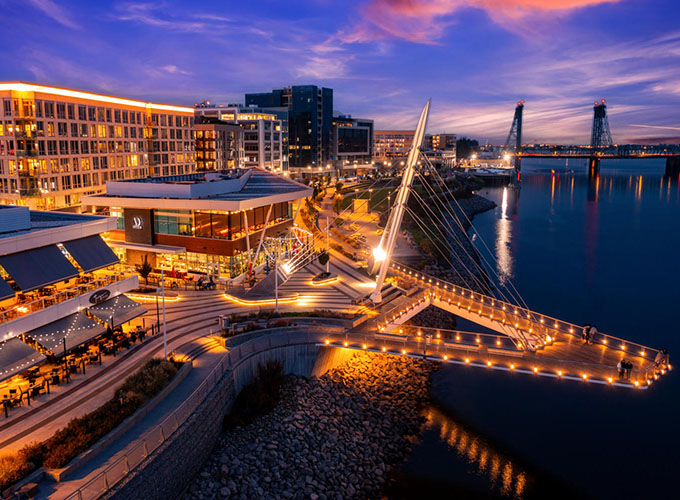 Aerial view of the Vancouver, WA, waterfront at sunset. As one of the best places to live in the U.S., Vancouver is an inclusive place to call home, with a proud LGBTQ community and a longstanding Pride celebration.