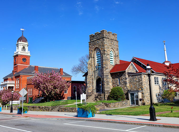 Historic buildings dot Warwick, RI, a city known for its role in sparking the American Revolution.