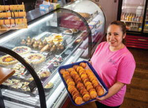 Owner Zaida Melendez prepares baked goods at Belén Casa de Pan.