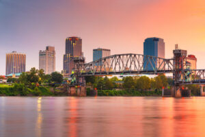 The city skyline overlooks the river in Little Rock, Arkansas.