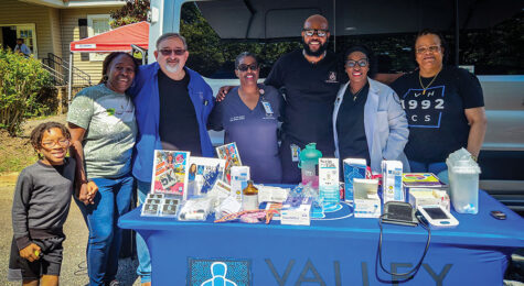 Dr. Kimberly Brown-Gullatt (middle) at an event.
