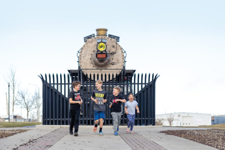 Railroad Park is a cute spot in downtown Williston where you can sit and watch the trains go by while you visit the park.