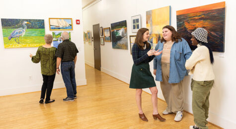 Lauren Luther chats with patrons of the arts.
