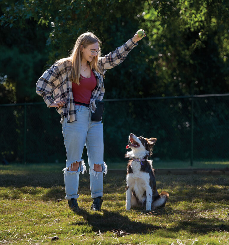 Morgan May and her dog, Mozart, at Greenville’s Off-Leash Dog Area.